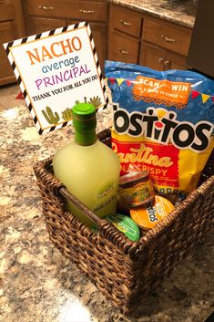 a basket filled with snacks sitting on top of a counter