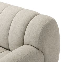 an upholstered couch with curved back and arm rests on a white surface, viewed from the front