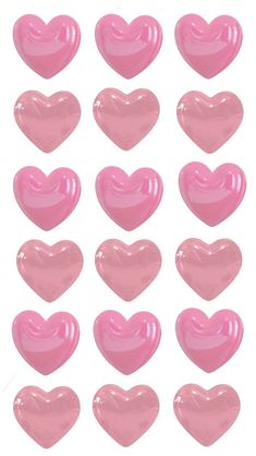 pink heart shaped candies on a white background