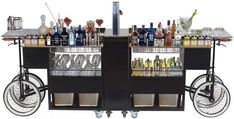 an image of a bar cart with drinks on it