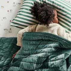 A bedding pattern that's graphic, versatile and grows with your child? Check, check, check. Our timeless, heirloom-quality Checkerboard Pine Green Quilt reimagines the classic checkerboard motif in luxuriously soft organic cotton velvet. Hand-pieced and hand-stitched by artisans in India, it's designed to last, and the deep green quilt layers well with our Comfy Tee heathered jersey sheets and duvet covers.   • Shell: 100% organic cotton velvet, grown without chemicals or pesticides  • Fill: 100 Light Green Boys Room, Olive Green Boys Room, Kids Bedding Ideas, Highland Nursery, Toddler Boy Bedding, Boys Woodland Bedroom, Checkered Quilt, Boy Room Bedding, Scandinavian Quilts