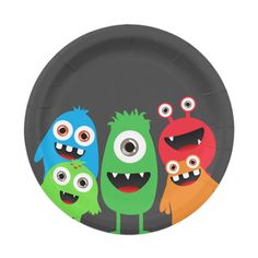 a paper plate with three monsters on it