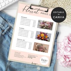 a pink and white floral price list on a clipboard next to a pair of jeans