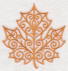 an embroidered maple leaf is shown on a white towel with gold threadwork in the shape of swirls