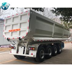 a large dump truck parked in a parking lot