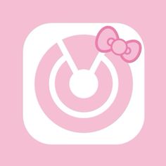 a pink wallpaper with an image of a bow on it