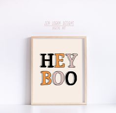 an art print with the words hey booo in black, orange and pink on it