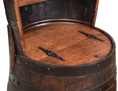 an old wooden barrel with iron straps on it