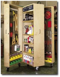 an open cabinet with tools on wheels in a room filled with other items and people