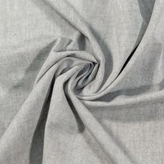 a close up shot of the grey fabric