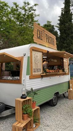 an old camper converted into a food truck