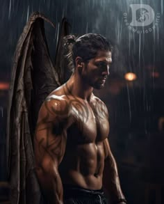 a shirtless man standing in the rain with an angel wings on his shoulder and chest