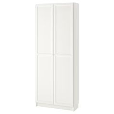 a tall white cabinet with two doors