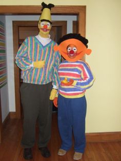 two people in costumes standing next to each other