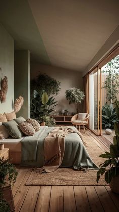 a bedroom with wooden floors and lots of plants