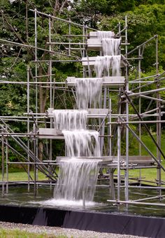 the water is running down the metal pipes