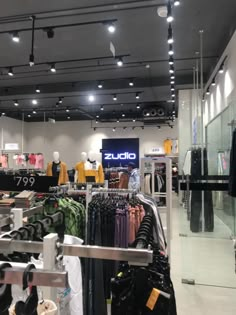 a clothing store filled with lots of clothes