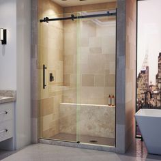 a bathroom with a tub, sink and shower