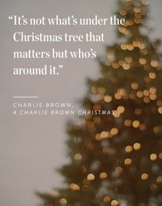 a christmas tree with the quote it's not what's under the christmas tree that matters but who's around it?