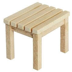 a small wooden stool sitting on top of a white floor