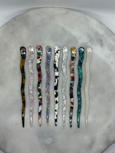 "These Vintage Style Wavy Hair Sticks are fun and unique! They are available in a variety of colors and they measure 7\" in length. They are a unique take on a tradition hair stick, they are flat and wavy all the way down. These hair sticks are great for styling your hair in a trendy but elegant way. They are sold as a single stick and they do have a bit of bend to them so they don't snap when you put them in your hair. These hair sticks make a great gift for yourself or someone else!" Hair Sticks Aesthetic, Hair Sticks Hairstyles, Hair Stick Styles, Hair Sticks Thick Hair, Hair Stick, Clay Hair Stick, Chinese Hair Stick, Spanish Hairstyles, Metal Hair Sticks