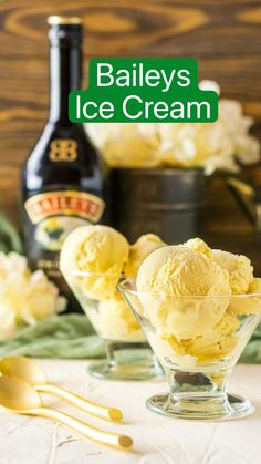 bailey's ice cream in a glass bowl with spoons and bottle behind it