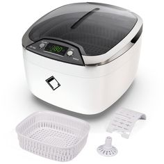 an image of a white and black food dehydrator with digital timers