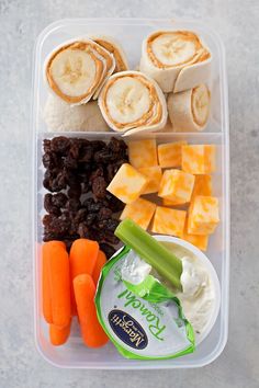 a plastic container filled with different types of food