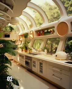 the interior of a futuristic kitchen with lots of windows and plants in pots on the counter