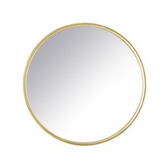 a round gold mirror on a white background