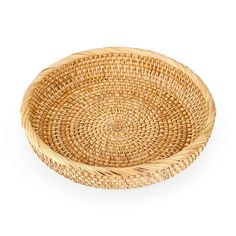 a round woven basket on a white background