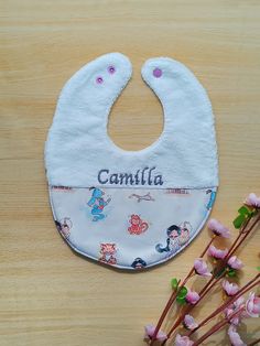 Very soft bamboo and cotton terry bib with embroidered name. "Aladdin" themed fabric and customizable with a name or phrase of your choice. In the notes (before completing the order) leave a telephone number to give to the courier, in case of problems with the delivery he will contact you immediately! Birth Gift, Telephone Number, Girls Clothing Sets, Clothing Sets, Newborn Gifts, Aladdin, Girls Clothing, Bibs