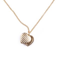 Limited edition Vintage striped brass heart locket that slides open. Nickel free matte gold plated brass chain. 18" long. Heart is 1" x 1 1/4". Heart Locket Necklace, Heart Locket, Brass Chain, Locket Necklace, Matte Gold, Locket, Slides, Gold Plate, Limited Edition