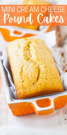 a close up of a cake in a pan with the words mini cream cheese pound cakes