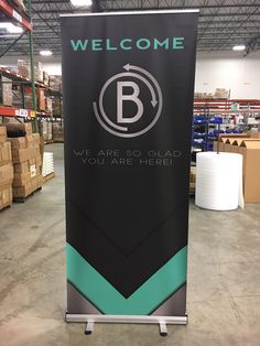 a sign that is in the middle of a warehouse