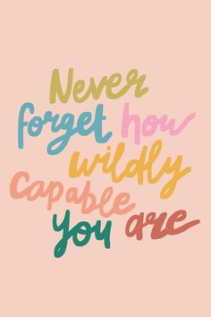 the words never forget how wildly capable you are on a pink background with multicolored lettering