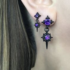 The Starburst stud earrings with Purple Glass stones are the perfect accessory for those who love gothic and celestial styles. The dreamy Blue stone  adds a touch of elegance, making them a beautiful addition for both men and women. With their unique design and high-quality materials, these earrings are a must-have for any fashion-forward individual. Sold as Pair Material: 316 Stainless steel Large stars: 36mm long /14 mm wide Small Stars: 22mm long/  9mm wide Standard post 21G Closure: butterfly push back Listing for pair of stud only *RETURNS / REFUNDS * -If you would like to return you purchase , please contact us within 7 days of receiving your package and we will accept the return.Return will only be made to the product, and not the shipping cost.  -Buyer is  responsible for the retur Cheap Purple Star-shaped Jewelry, Edgy Star-shaped Pierced Earrings, Edgy Star-shaped Earrings For Gift, Gothic Star-shaped Pierced Earrings, Men's Earrings, Small Stars, Earrings Gothic, Starburst Earrings, Gothic Earrings