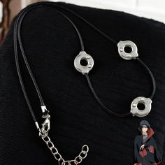 ✨ Unique Design: Features a stunning 3 loops design inspired by the iconic Uchiha Itachi from anime lore. -Durable Material: Crafted from high-quality titanium steel, ensuring longevity and a sleek look that resists tarnish. -Perfect for Cosplay: Elevate your cosplay outfit with this striking choker, making you stand out at conventions or events! 👕 Versatile Style: Complements various outfits, whether casual or formal, making it a must-have accessory for both men and women. -Ethnic Touch: Infus Itachi Necklace, Itachi Uchiha Necklace, Adjustable Themed Jewelry For Cosplay, Adjustable Handmade Necklace For Cosplay, Disney Princess Makeover, Anime Jewelry, Itachi Uchiha, Unique Gifts For Her, Ethnic Jewelry