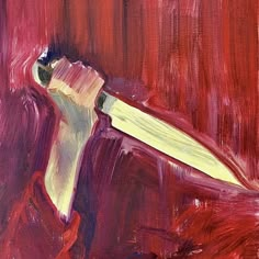 a painting of a knife sticking out of the side of a red piece of paper