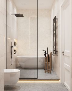 a bathroom with a tub, toilet and sink