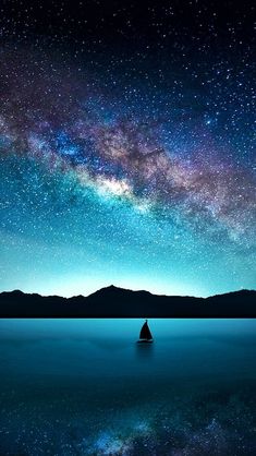 a boat floating on top of a lake under a night sky filled with stars