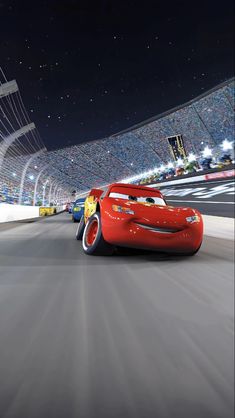 the cars are racing down the track in disney's cars 2 video game, which is currently available for pre - order