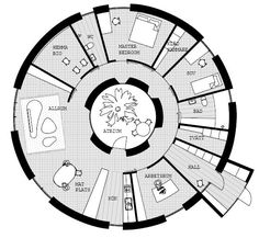 a circular room with furniture in it and floor plans on the inside, as well as other