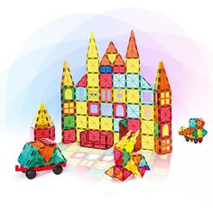 an assortment of colorful building blocks on a white background