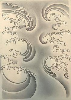 a drawing of waves and clouds on paper