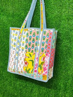 Women Tote Bag Handmade Block Printed Quilted Shoulder Bag's Indian Shopping Handbag Throw Cotton Quilted block print weekend bags 100% cotton fabric SIZE:- 14X12X2.5 Inch 16X15X5 Inch 18X18X8 Inch Usage : Cosmetic, Make-up, Travel, Toiletries, Tote Bag, Medicine, Accessories, Shoulder Bags, Handle Bag, Women Bags, Cosmetic Bag, Gift For Her, Bridesmaid Bag, Storage Bag, Grocery Bag, Shopping Bag, Carry Bags, Jhola Bag, Market Bag, Vintage Bags, Picnic Bags, Etc Shopping and much more. Perfect for Beach Visits/ Quick Grocery runs/ Carrying Kids items/ Artist Paint book and Paints /Extra Bag Washable on Cold / Delicate wash Weekend Bags, Fabric Tote Bag, Bridesmaid Bags, Fabric Tote Bags, Picnic Bag, Vintage Patches, Fabric Tote, Overnight Bags, Tote Bags Handmade