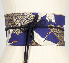 Beautiful belt in Japanese fabric on the outside and teal blue on the inside. To wear high-waisted like an Obi. The string is long enough to cross the belt in the back and close it in front with a nice little knot. The strings end with pearls. The cloth belt measures 104 cm of length and 14 cm of wide. On each side, the cordon is 70cm long. 100% cotton fabric, to hand wash to not damage the tassels. Handmade in France by Fleurs d'Ascenseurs. Now you can discover the several ways to wear my Obi b Tassels Handmade, Purple And Teal, Cloth Belt, Beautiful Belts, Obi Belt, Diy Sewing Clothes, Bleu Turquoise, Japanese Cotton, Suspender Belt