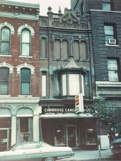 an old black and white photo of some buildings