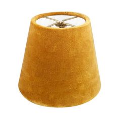 a yellow lamp shade on a white background