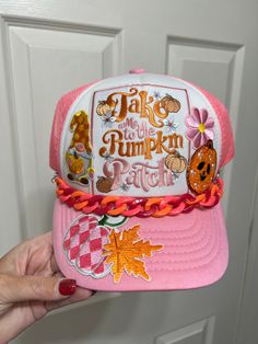 a pink trucker hat with the words take me to the pumpkin patch on it